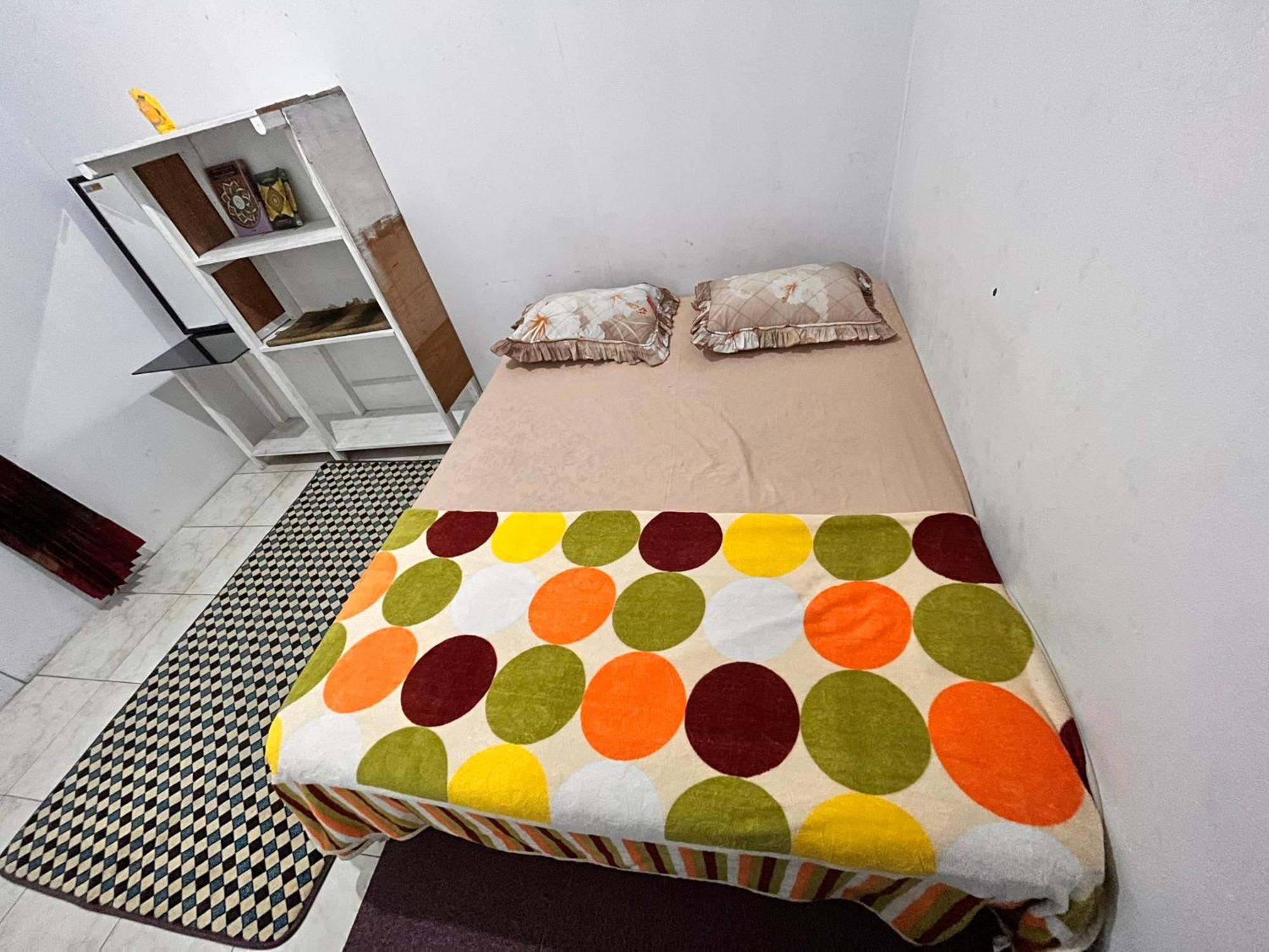 Rumah 25 Syariah Bukittinggi Phòng bức ảnh